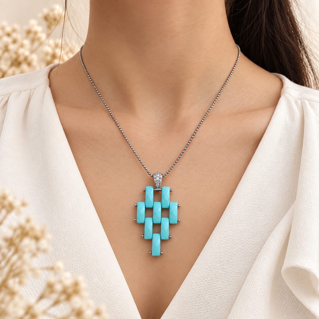 Collana Corda con Pendente Modello Cartier di Pasta Turchese 4 Fiori in Argento 925 Rodiato e Zirconi