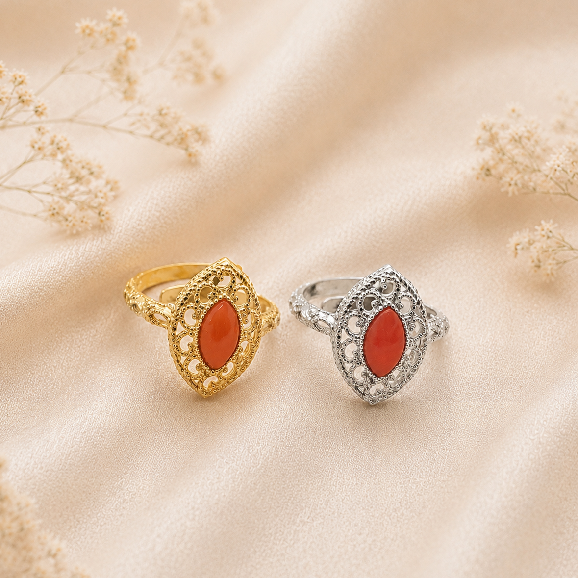 Anello Imperial da donna in Argento 925 disponibile in finitura placcata oro e rodiata con cabochon a navetta di Corallo Rosso Naturale del Mediterraneo e montatura traforata.