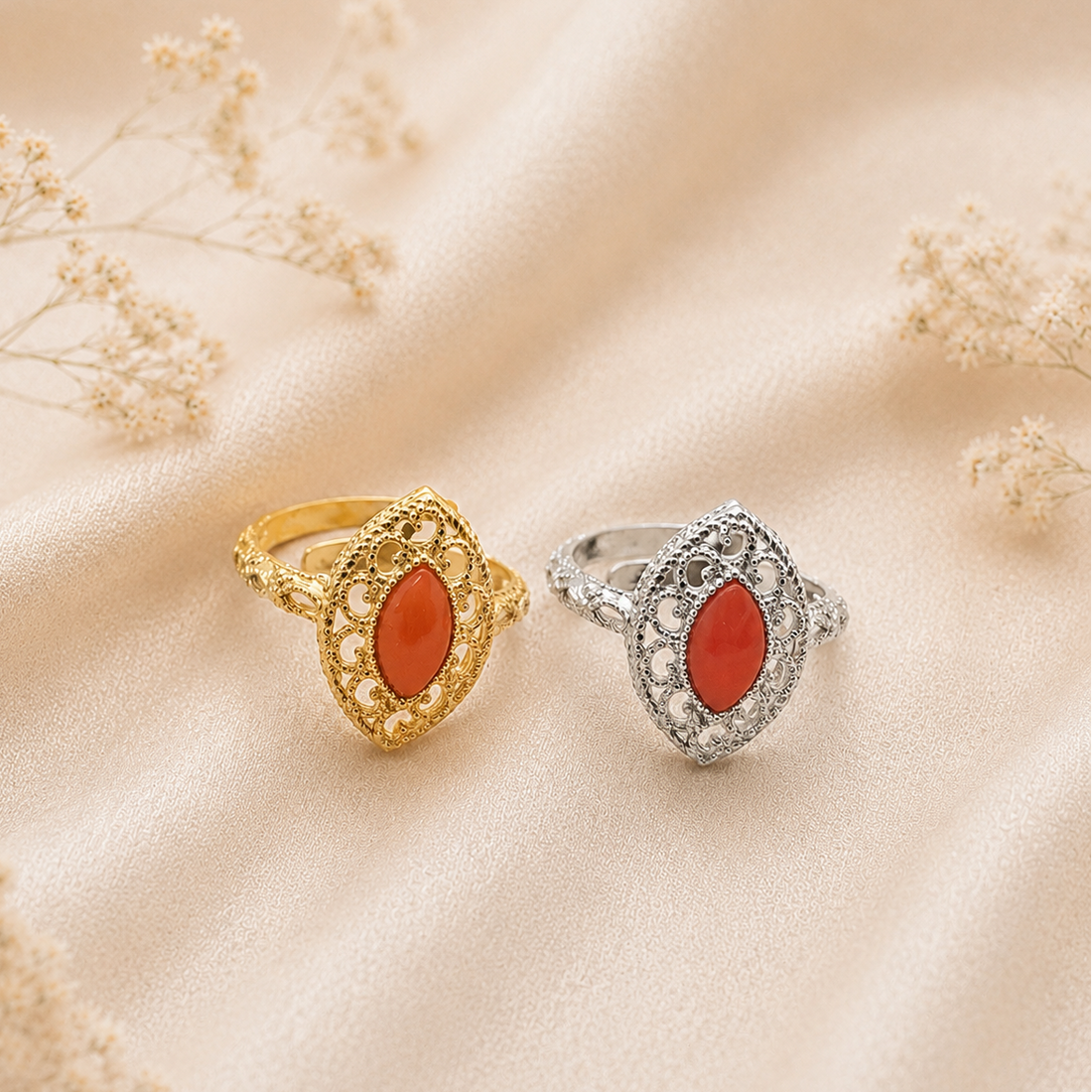 Anello Imperial da donna in Argento 925 disponibile in finitura placcata oro e rodiata con cabochon a navetta di Corallo Rosso Naturale del Mediterraneo e montatura traforata.