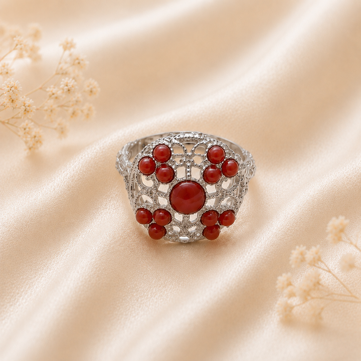 Anello Supreme da donna in Argento 925 regolabile con corallo rosso naturale del Mediterraneo, disponibile nelle finiture rodiata e placcata oro, realizzato artigianalmente in Italia.