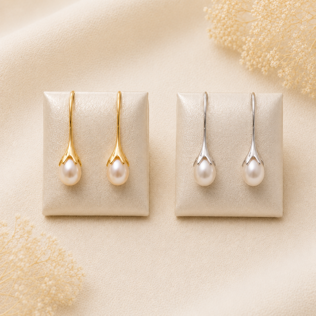 Orecchini pendenti con perle naturali a goccia in Argento 925, disponibili in finitura placcata oro e rodiata